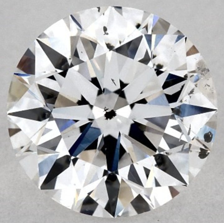 SI2 Diamond with Black Crystal Inclusion Under the Table Face-up view of a 1.01 carat D color SI2 diamond with a dark black crystal inclusion under the table.