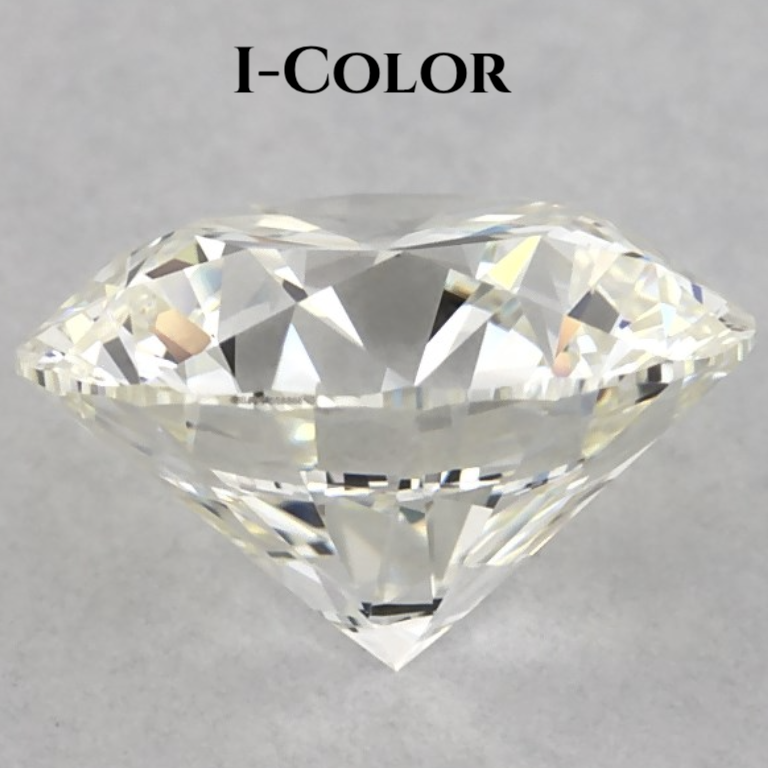 I Color — A subtle warmth appears facedown Facedown view of I color diamond revealing slight yellow tint