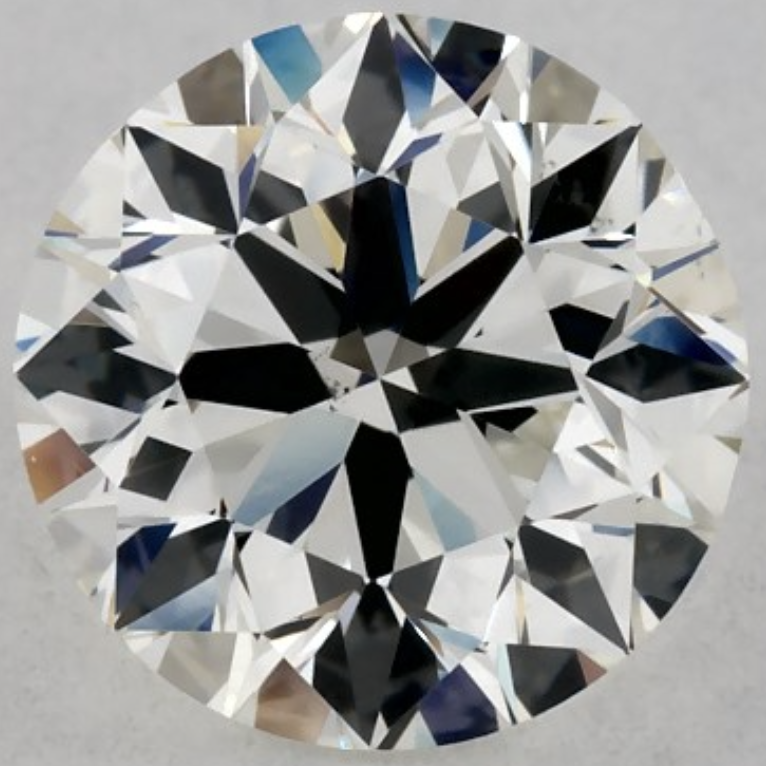 Standard J Color Diamond with No Fluorescence J color round diamond with no fluorescence viewed face-up under neutral lighting
