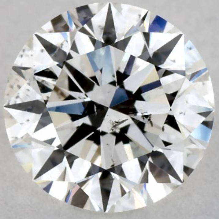 1 carat H color SI2 clarity round diamond with visible black inclusions under the table