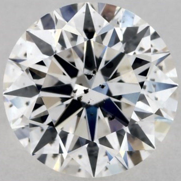 This SI2 diamond has visible dark inclusions right under the table SI2 diamond with dark crystal inclusions under the table, 1.00 carat, G color from James Allen