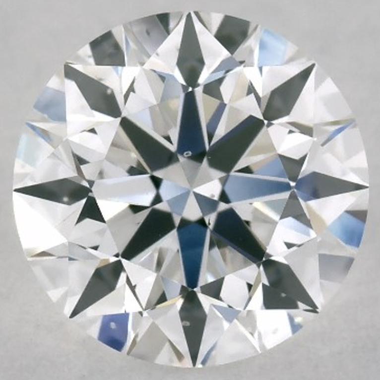 Strong Fluorescence D Color Diamond with Slightly Hazy Appearance D color VS2 diamond with strong fluorescence showing visible haziness