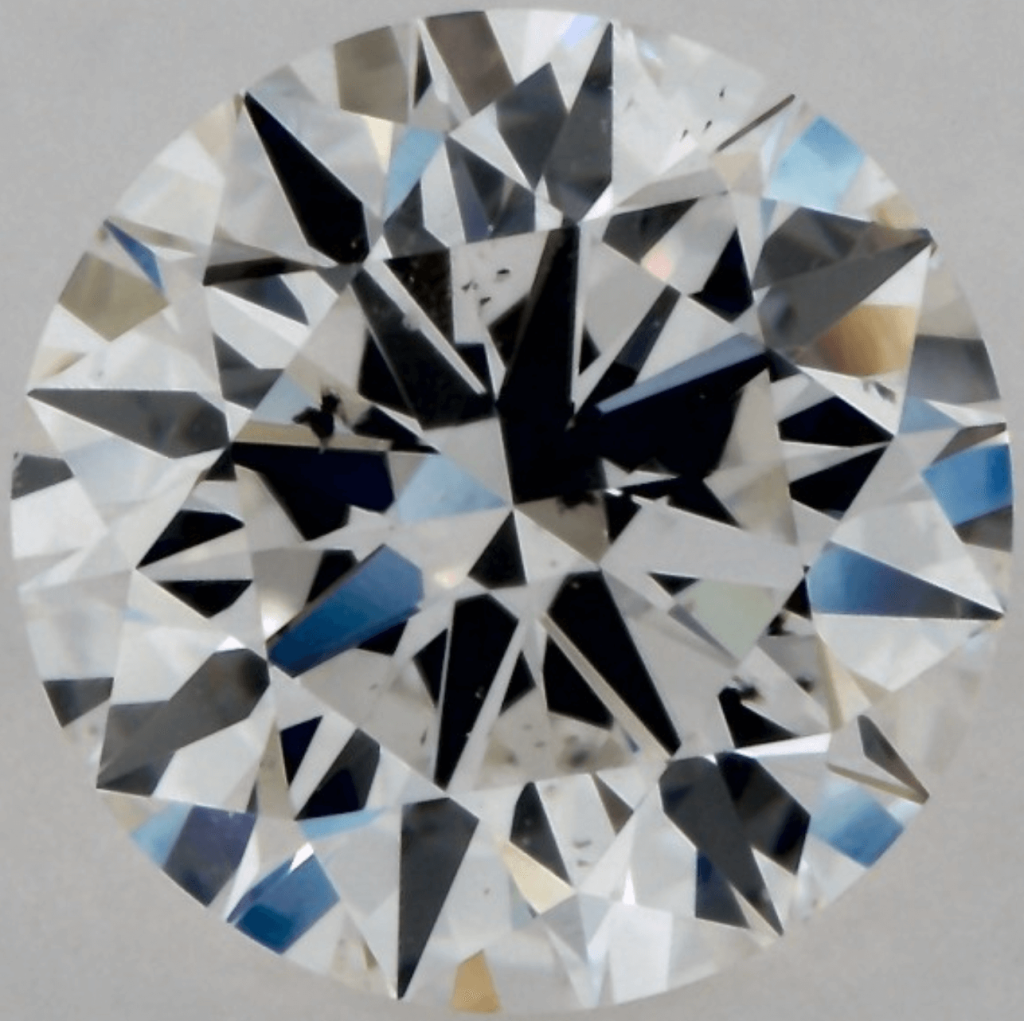 Not Eye-Clean SI1 Diamond with Dark Crystal Inclusion at 10 o'clock position Not Eye-Clean SI1 Diamond with Dark Crystal Inclusion under the Table