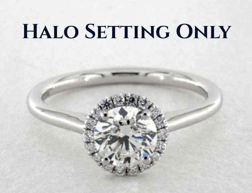 Halo ring without pavé accents Halo engagement ring with round center diamond and plain band, no pavé accents