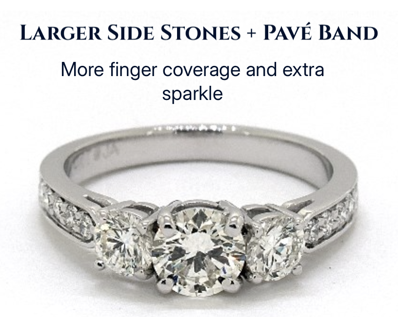Bold Sparkle with Bigger Side Stones Three-stone engagement ring with larger side diamonds and pavé band for enhanced sparkle